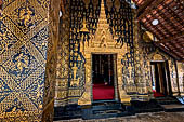 Wat Xieng Thong temple in Luang Prabang, Laos. The main entrance of the sim. 